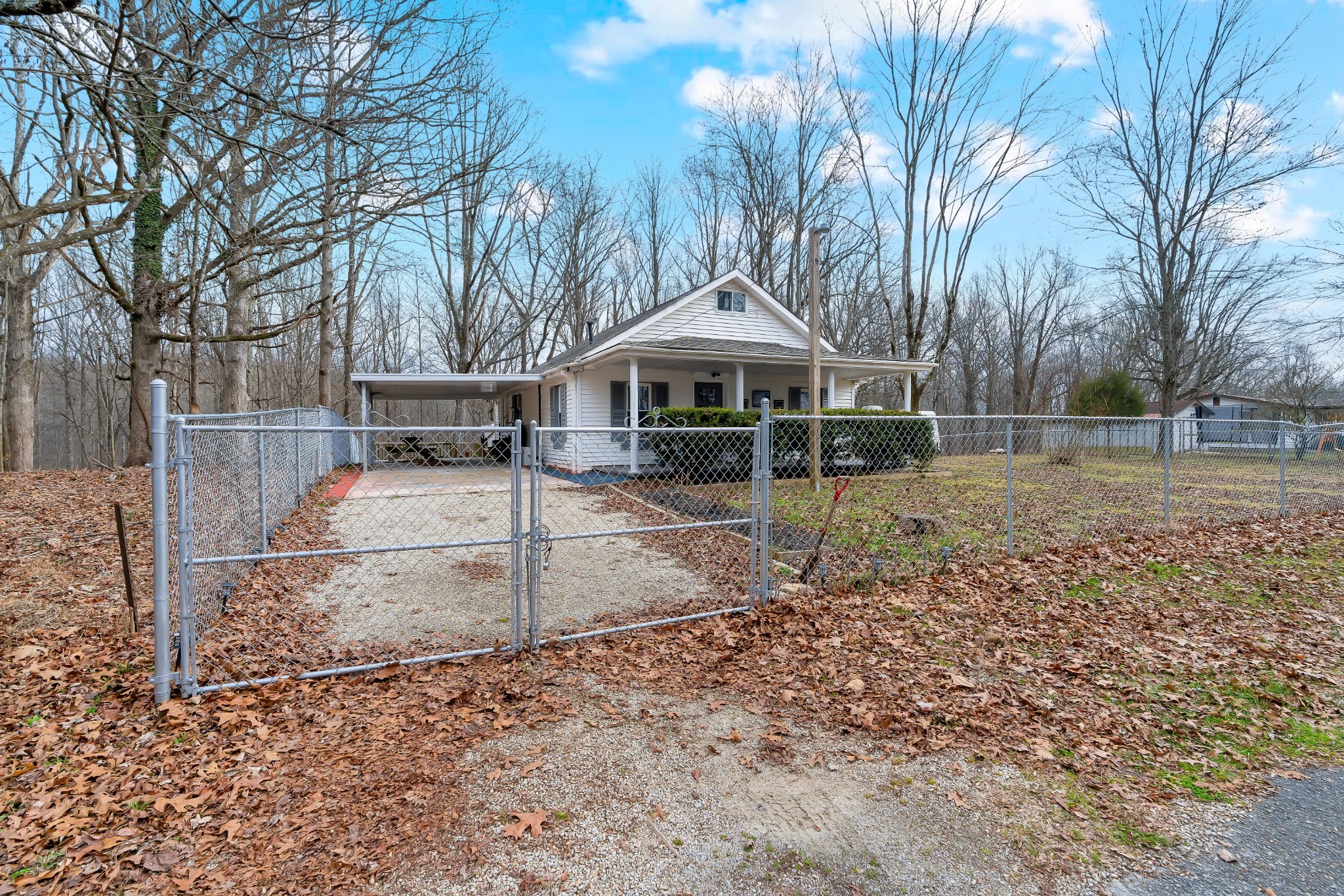 408 Spring Street Monteagle, TN 37356 - Photo 7 of 58 a view of a house with a yard