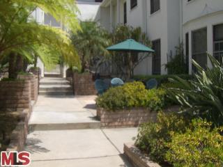 8559 Holloway Drive, Unit 2 West Hollywood, CA 90069 - Photo 1 of 10 a view of a pathway with an umbrella