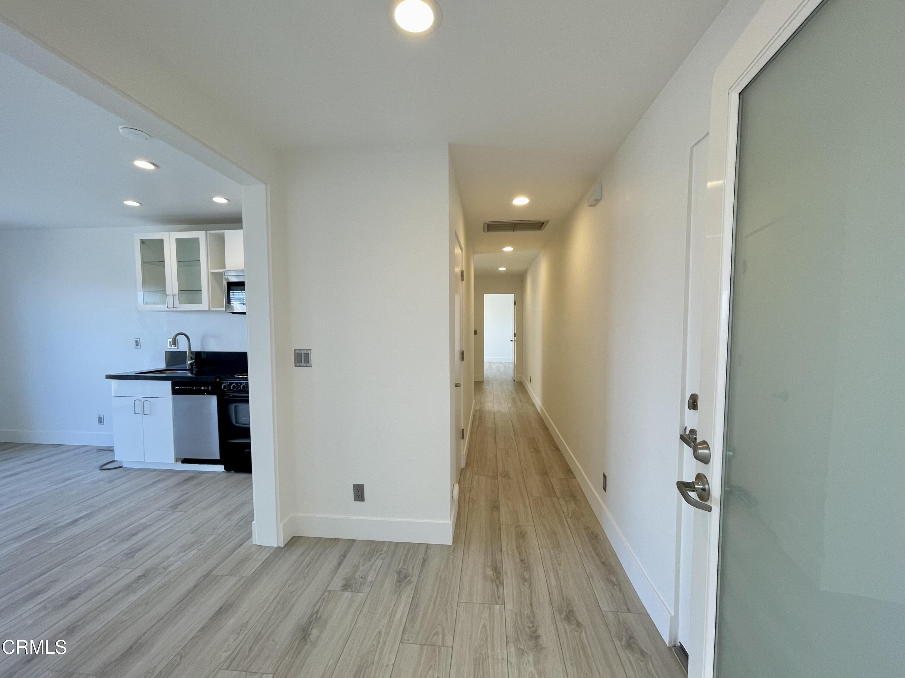 333 Lakeshore Drive, Unit LOWR Oxnard, CA 93035 - Photo 8 of 23 Hallway to bedrooms
