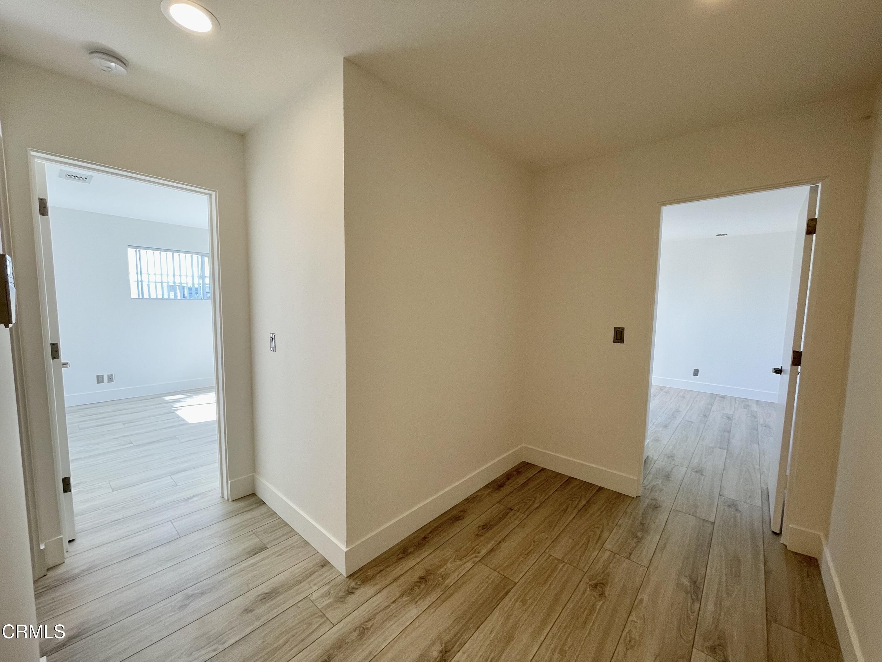 333 Lakeshore Drive, Unit LOWR Oxnard, CA 93035 - Photo 9 of 23 hallway to bedrooms