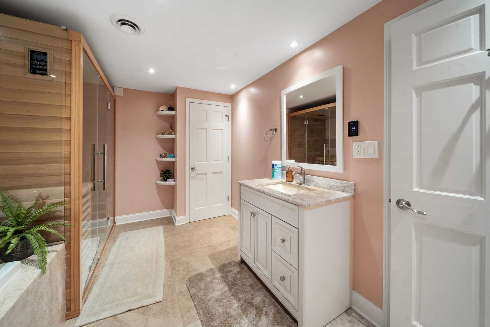 5N750 Medinah Road Medinah, IL 60157 - Photo 31 of 53 a bathroom with a granite countertop sink a mirror and shower