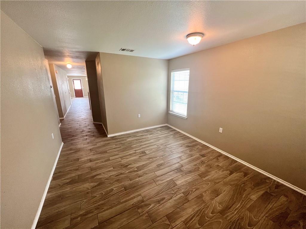 7813 Duber Lane Austin, TX 78747 - Photo 4 of 20 a view of an empty room