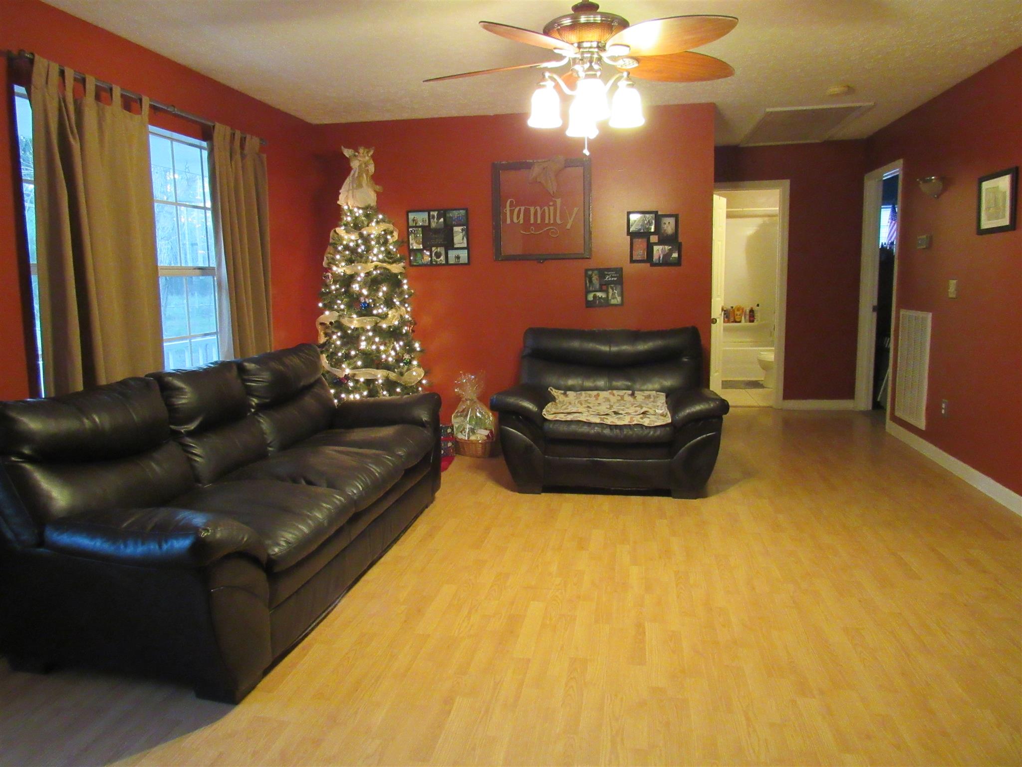 307 Butler Road Portland, TN 37148 - Photo 20 of 21 a living room with furniture and a fireplace
