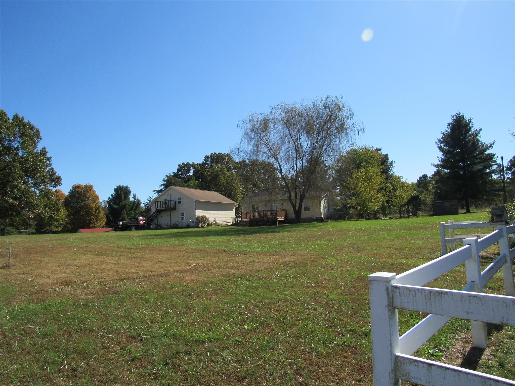 307 Butler Road Portland, TN 37148 - Photo 7 of 21 a view of a field of grass and trees