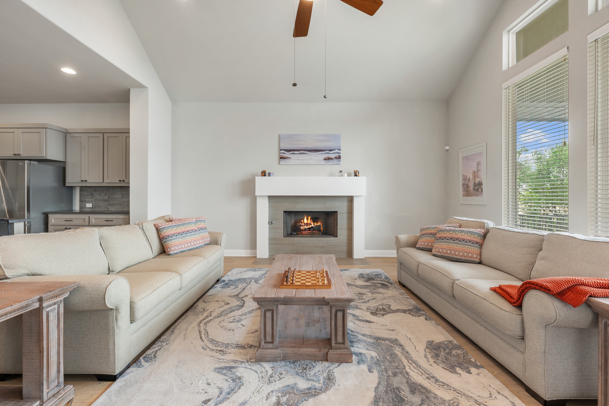 510 Elworth Path Austin, TX 78738 - Photo 8 of 40 a living room with furniture and a fireplace