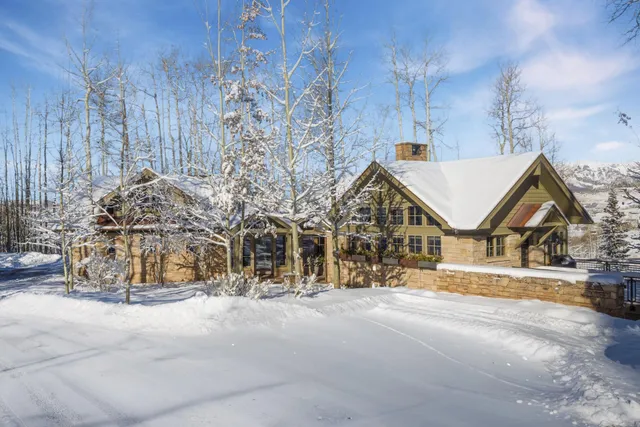 a view of a house with a street
