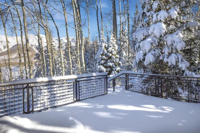 a view of a house with outdoor seating