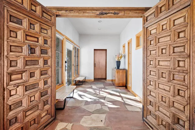 a view of a bathroom with a shower and a window