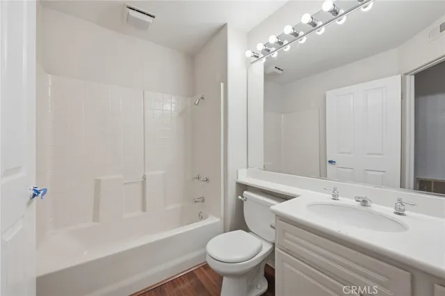 a kitchen with a refrigerator stove and microwave