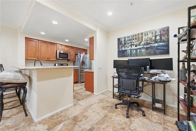 a view of a workspace with furniture