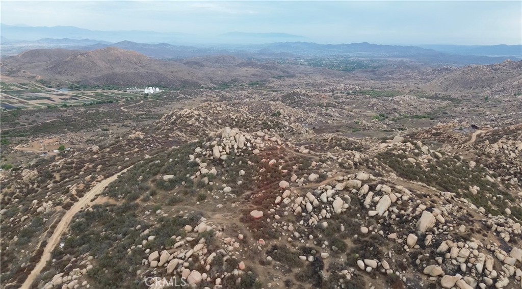 1 La Barranca Road Perris, CA 92570 - Photo 11 of 14 a view of a large mountain with trees in the background