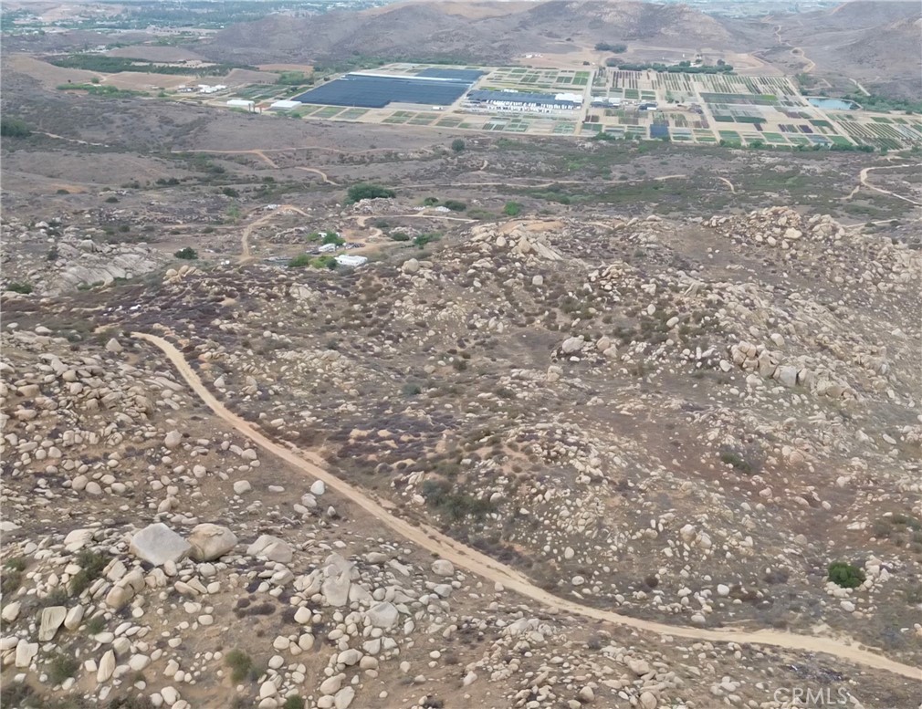 1 La Barranca Road Perris, CA 92570 - Photo 8 of 14 a view of a dry yard with wooden floor