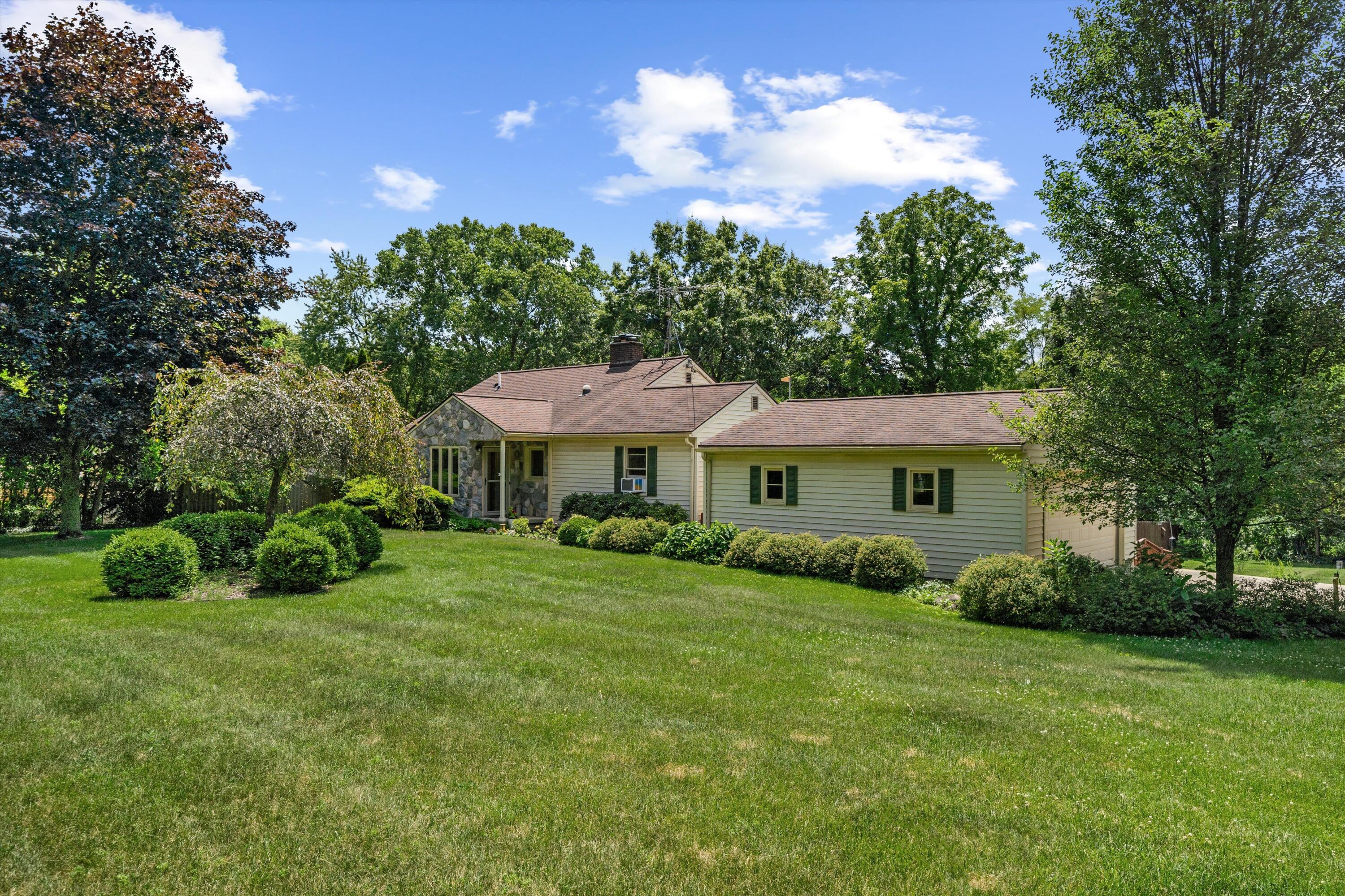 16009 Cavanaugh Lake Road Chelsea, MI 48118 - Photo 2 of 56 Front