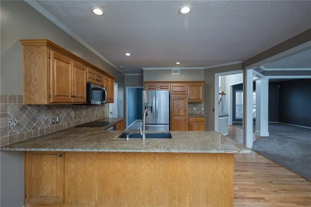 $439,000 | 5805 Northeast Ruby Court, Lee's Summit, MO 64064