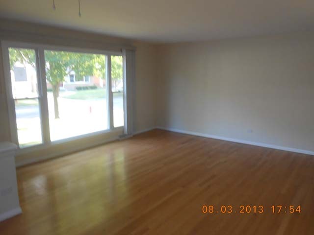 182 West Burlington Street Riverside, IL 60546 - Photo 3 of 11 an empty room with a window