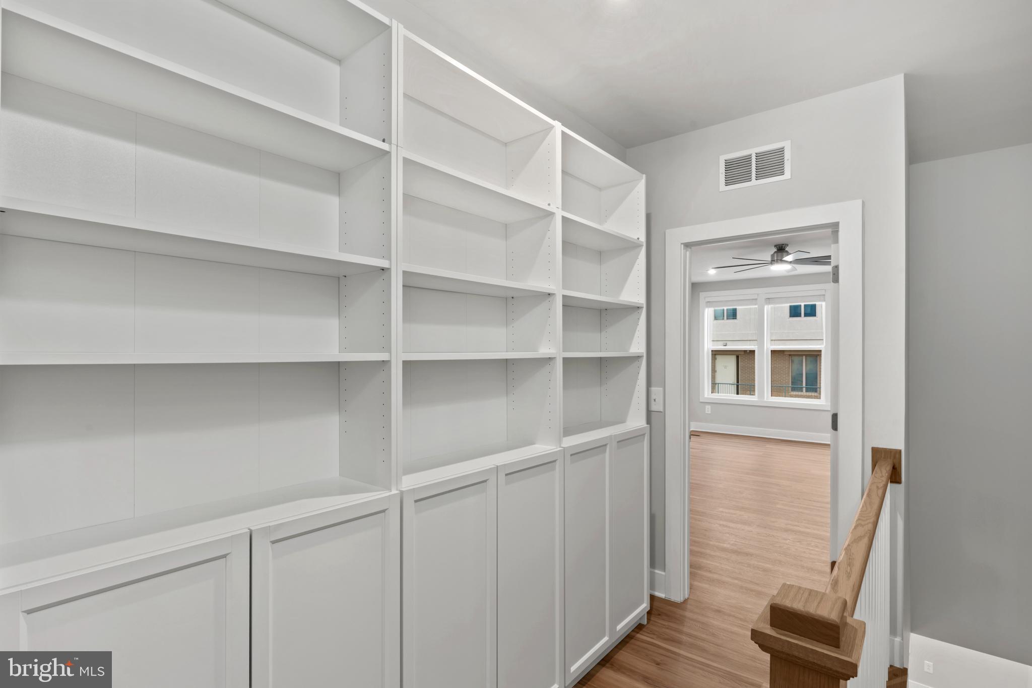 1704 Bandit Loop, Unit 20A Reston, VA 20190 - Photo 22 of 42 2ND FLOOR HALLWAY W/FURNITURE