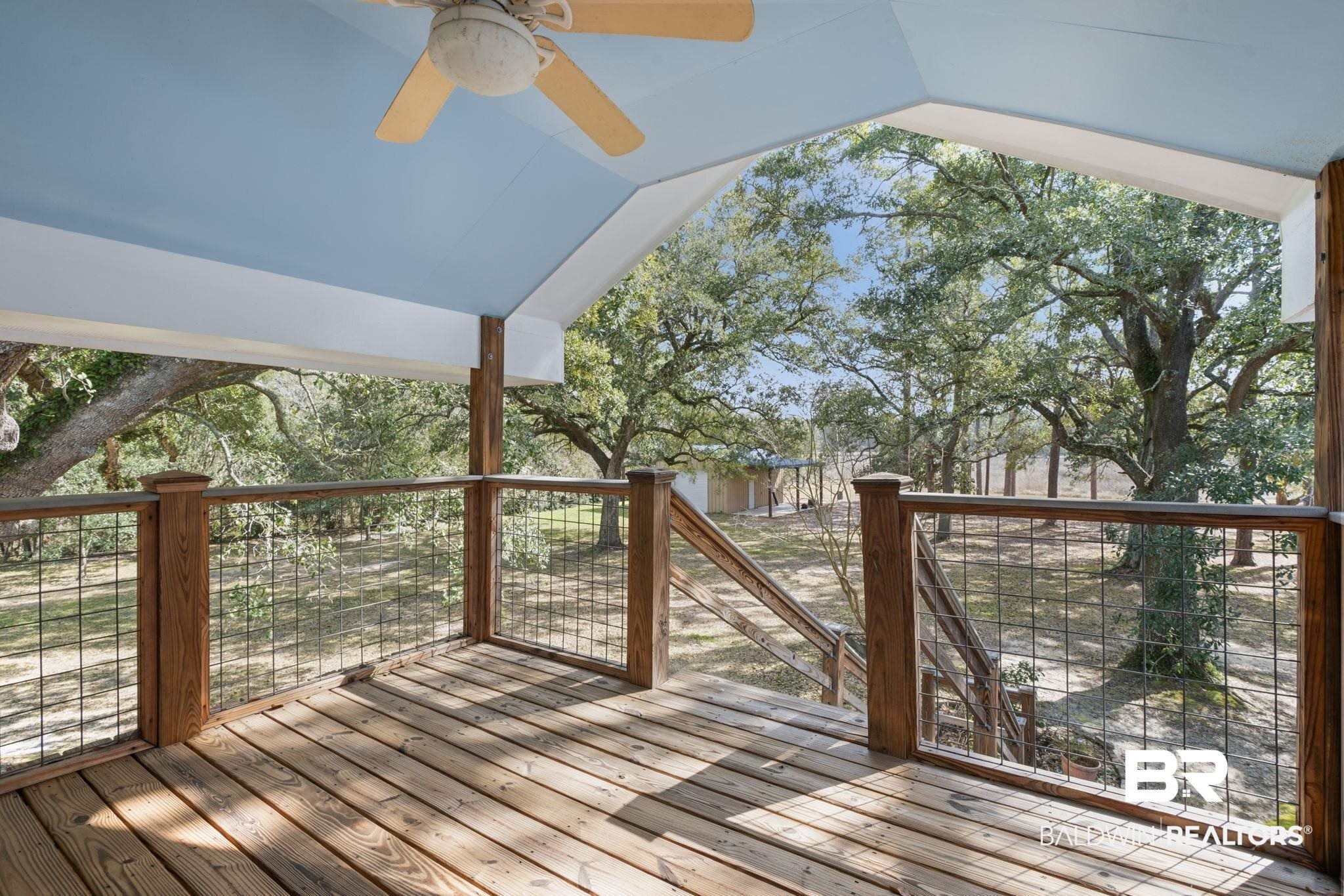 15025 Bellingrath Road Coden, AL 36523 - Photo 67 of 79 Wooden terrace featuring ceiling fan