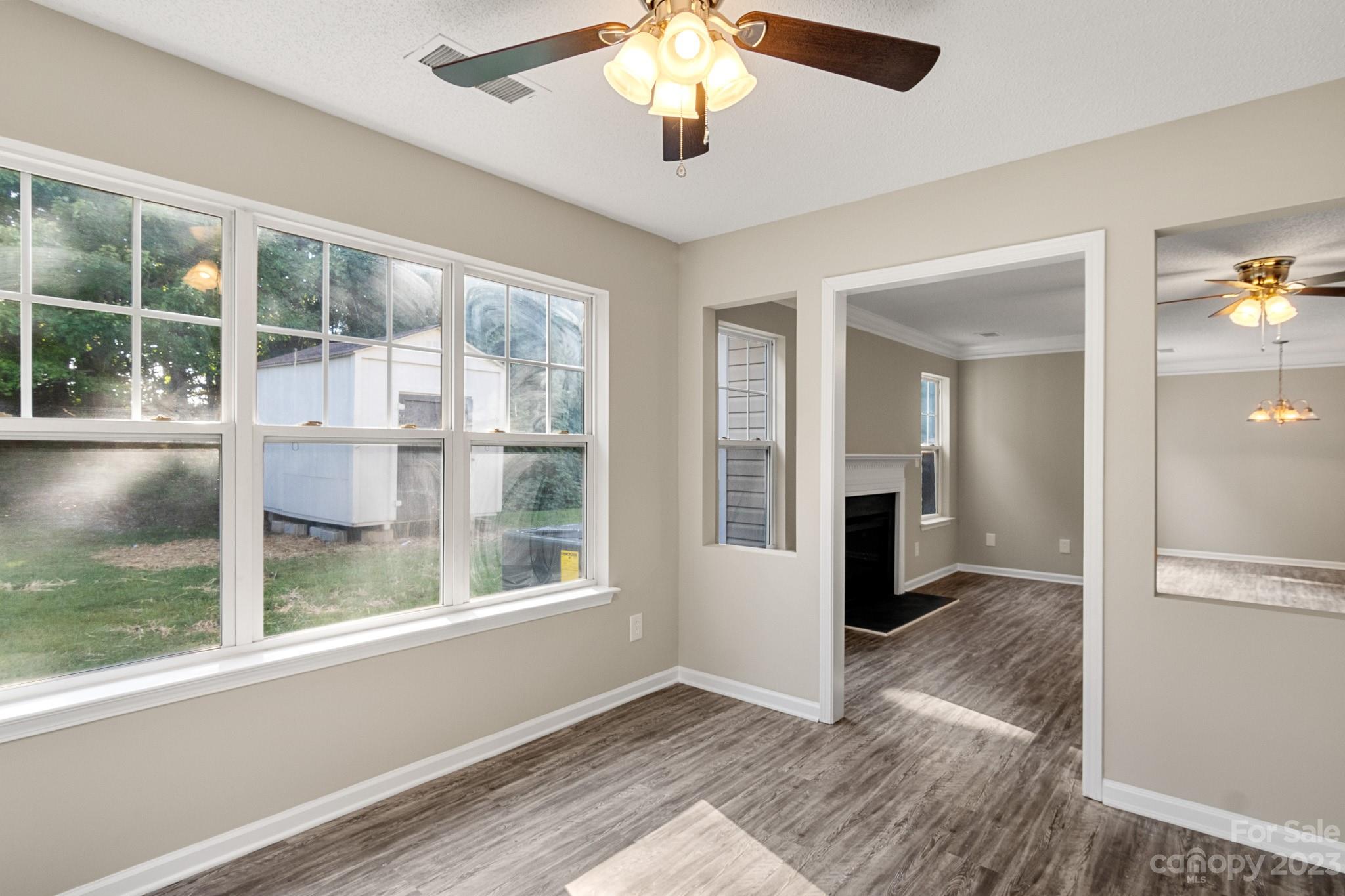 845 Raindrops Road Gastonia, NC 28054 - Photo 18 of 40 wooden floor in an empty room with a window
