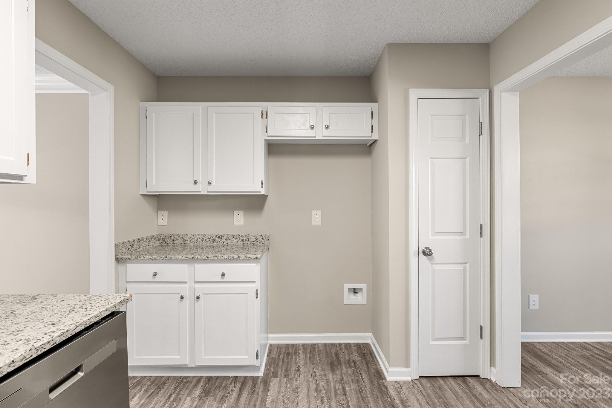 845 Raindrops Road Gastonia, NC 28054 - Photo 10 of 40 a kitchen with a sink a stove and cabinets