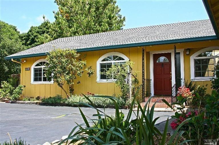 1407 Schaeffer Road Sebastopol, CA 95472 - Photo 1 of 1 a front view of a house with a yard