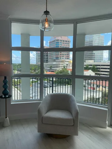 a view of a balcony with wooden floor