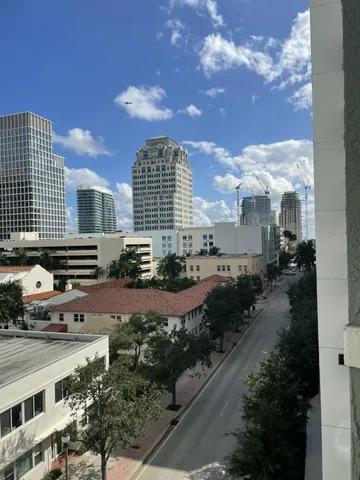 a bedroom with a bed and a lamp