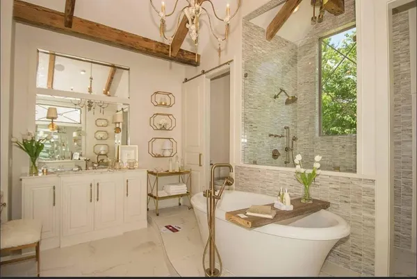 a bathroom with a toilet sink and shower