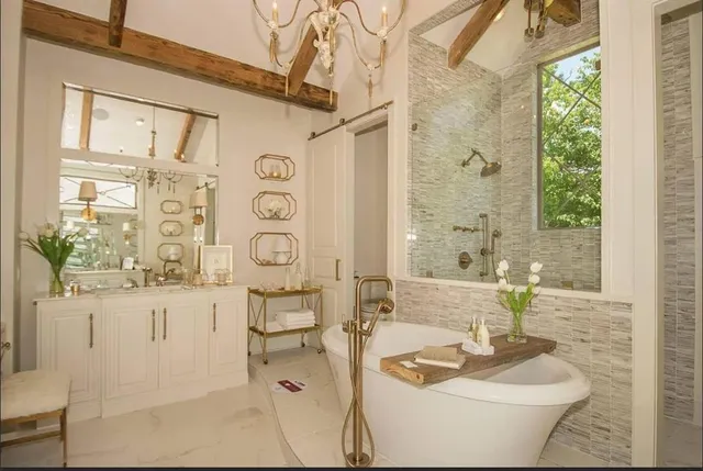 a bathroom with a toilet sink and shower