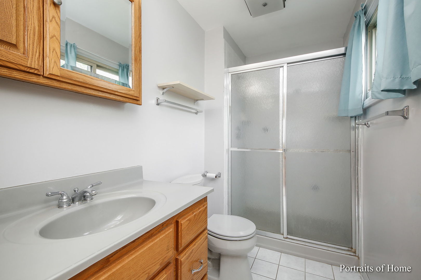 417 South River Road Naperville, IL 60540 - Photo 12 of 27 a bathroom with a granite countertop sink toilet and shower