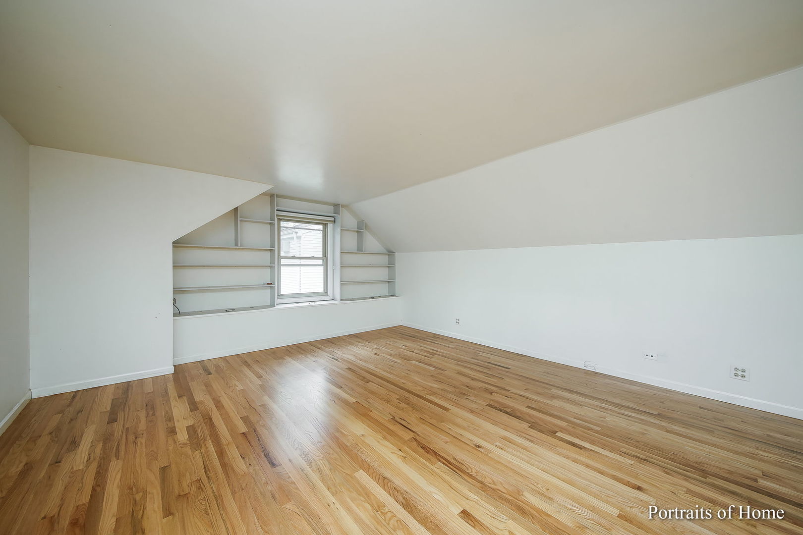 417 South River Road Naperville, IL 60540 - Photo 13 of 27 a view of empty room with wooden floor and fan