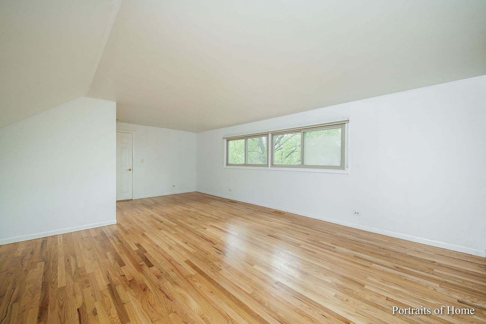 417 South River Road Naperville, IL 60540 - Photo 14 of 27 an empty room with wooden floor and windows