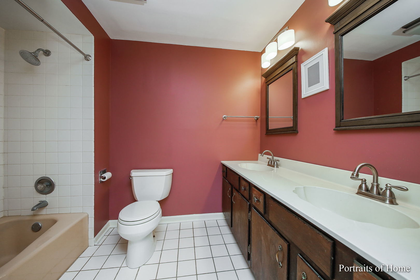 417 South River Road Naperville, IL 60540 - Photo 17 of 27 a bathroom with a sink a toilet and shower