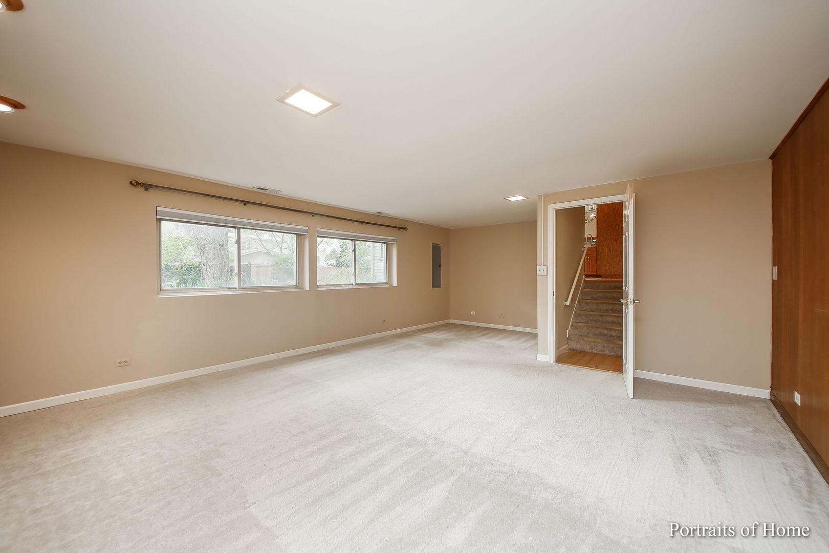 417 South River Road Naperville, IL 60540 - Photo 20 of 27 a view of an empty room with a window