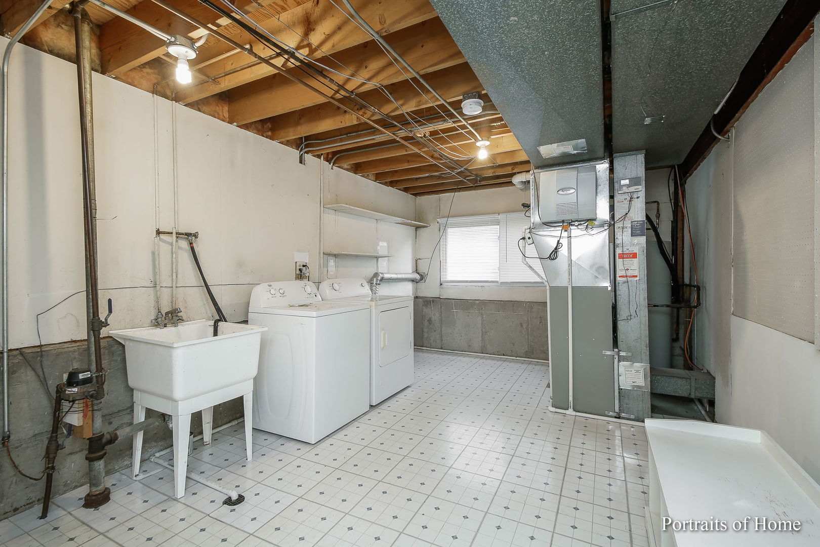 417 South River Road Naperville, IL 60540 - Photo 23 of 27 a utility room with dryer and washer