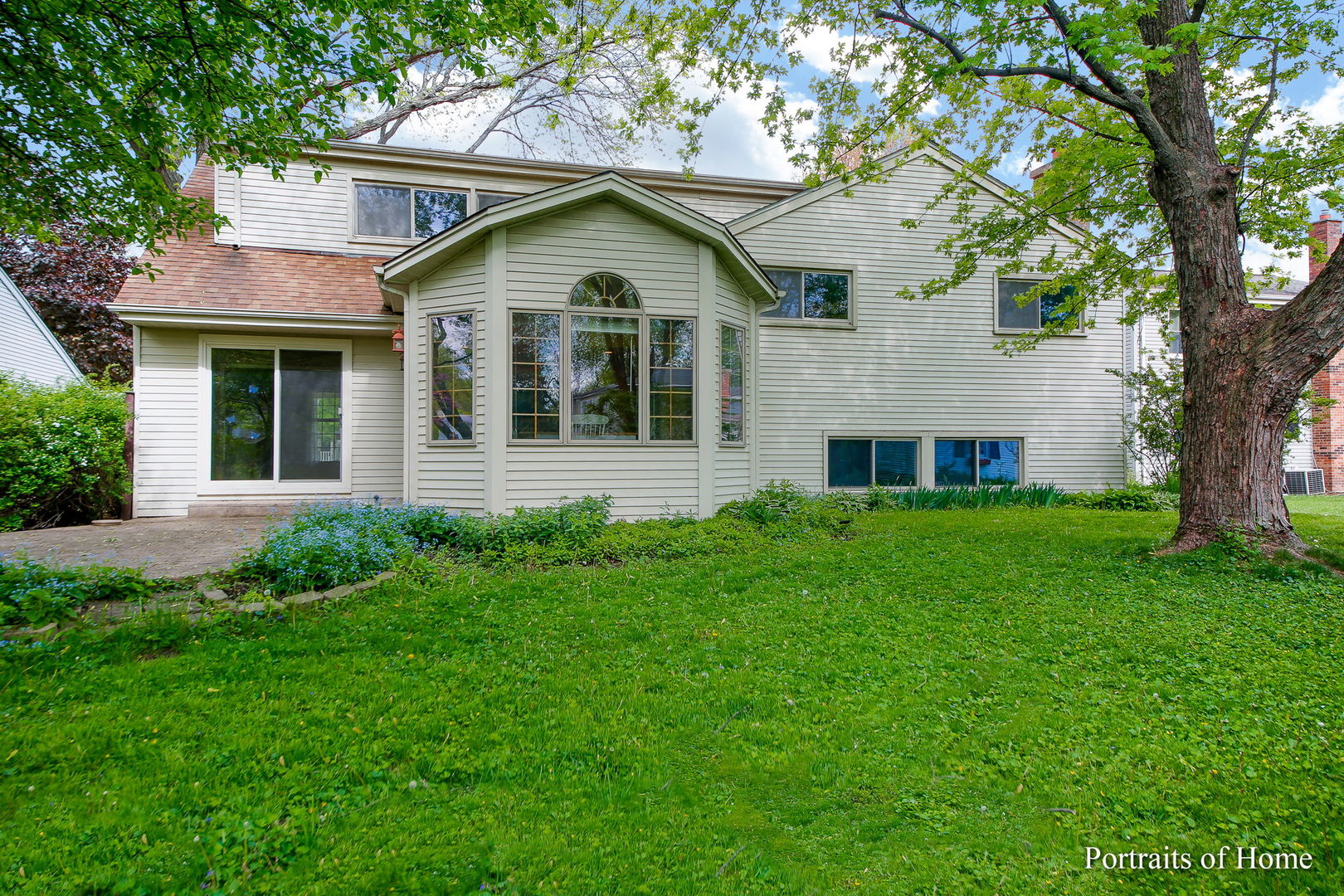 417 South River Road Naperville, IL 60540 - Photo 25 of 27 a view of a house with a yard