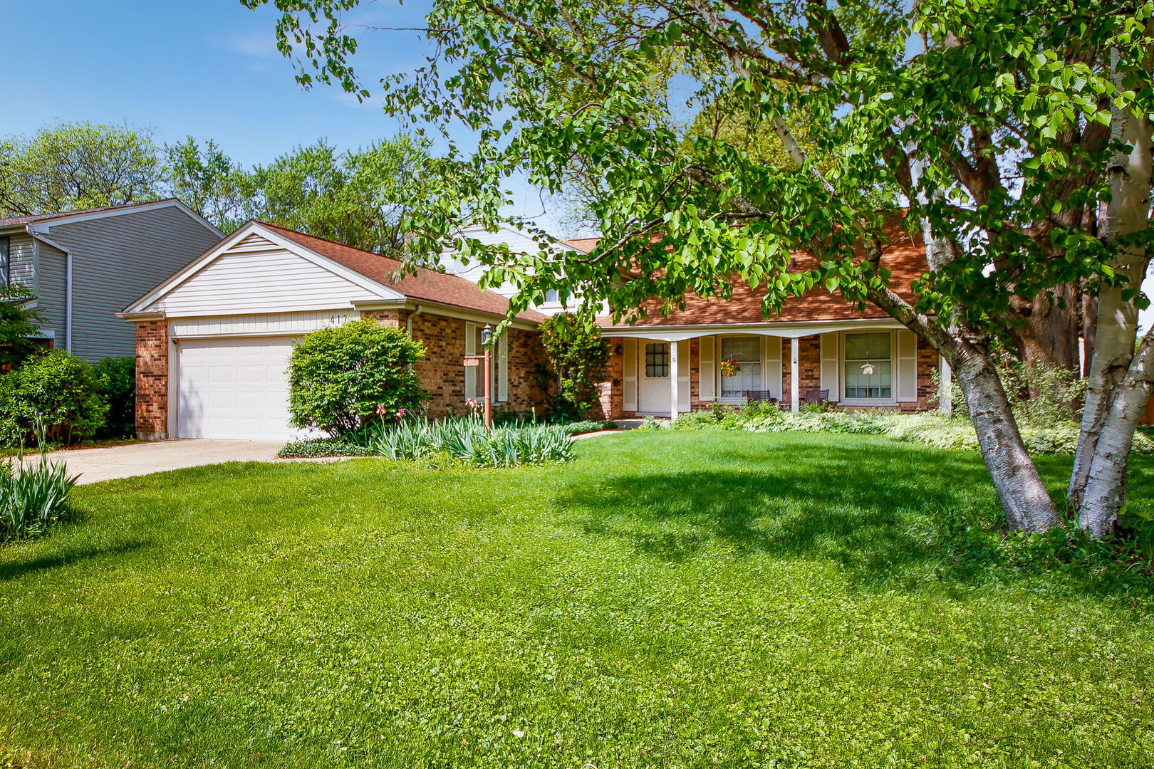 417 South River Road Naperville, IL 60540 - Photo 27 of 27 a front view of a house with a garden