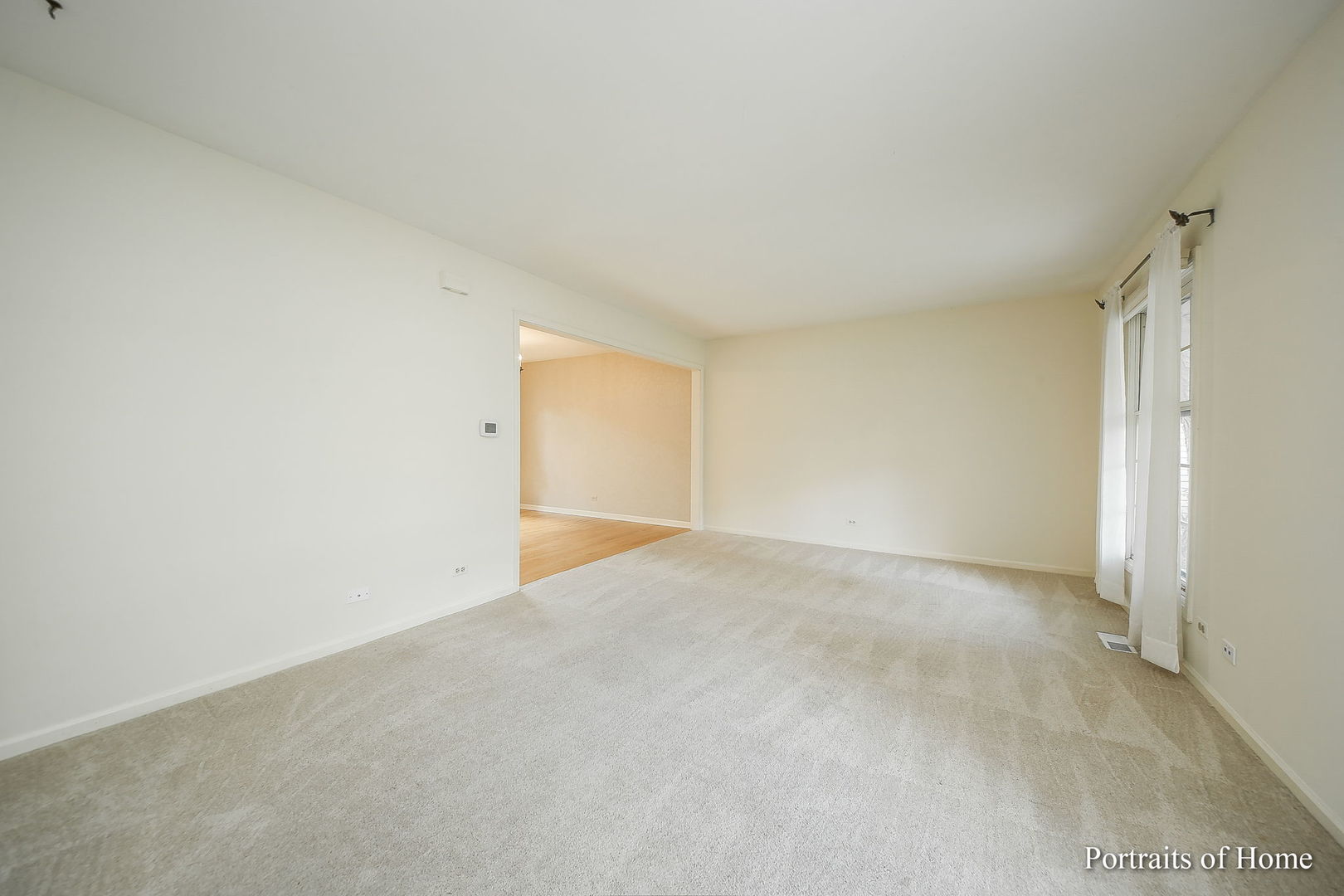 417 South River Road Naperville, IL 60540 - Photo 4 of 27 a view of an empty room and a window