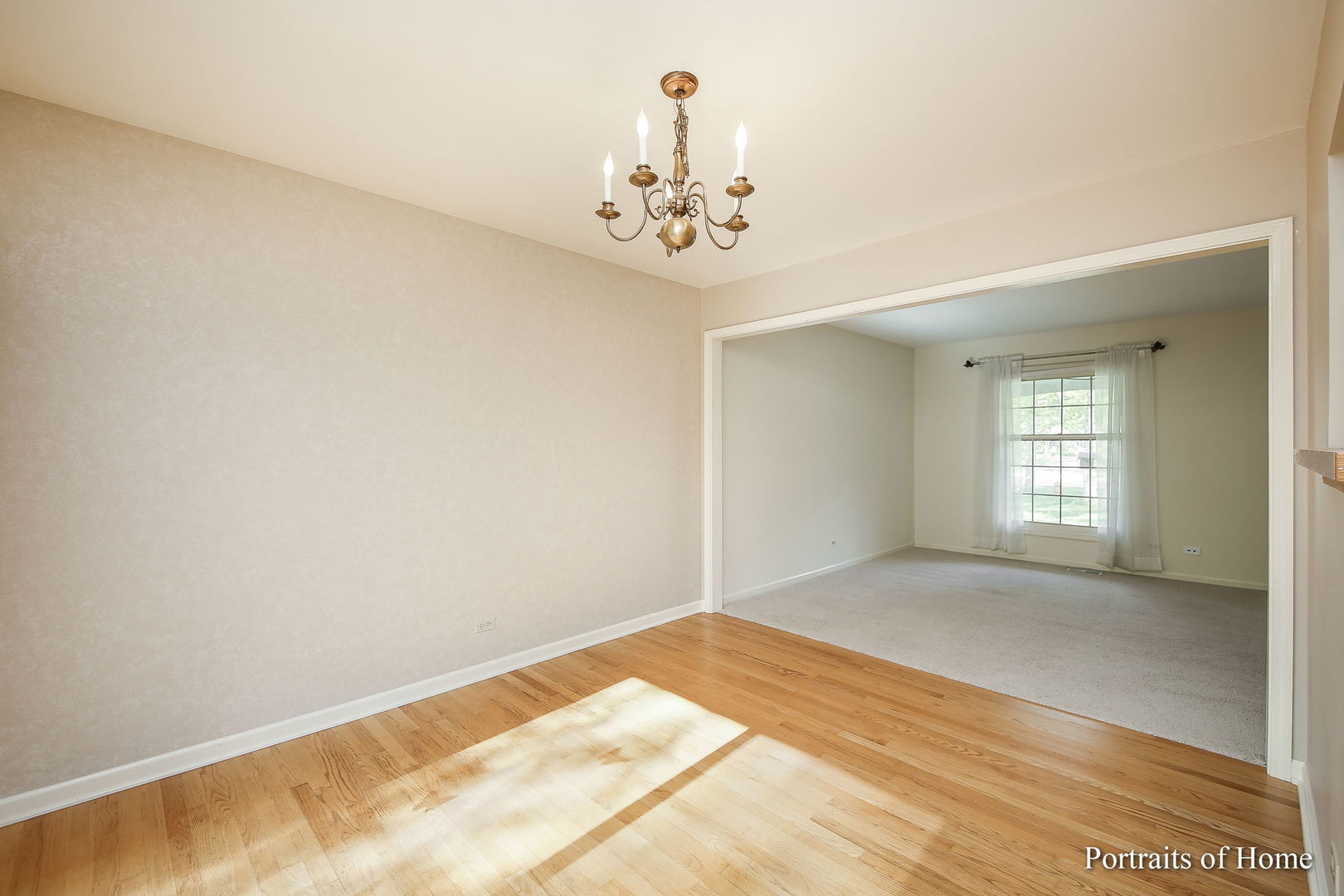417 South River Road Naperville, IL 60540 - Photo 5 of 27 a view of an empty room with a window