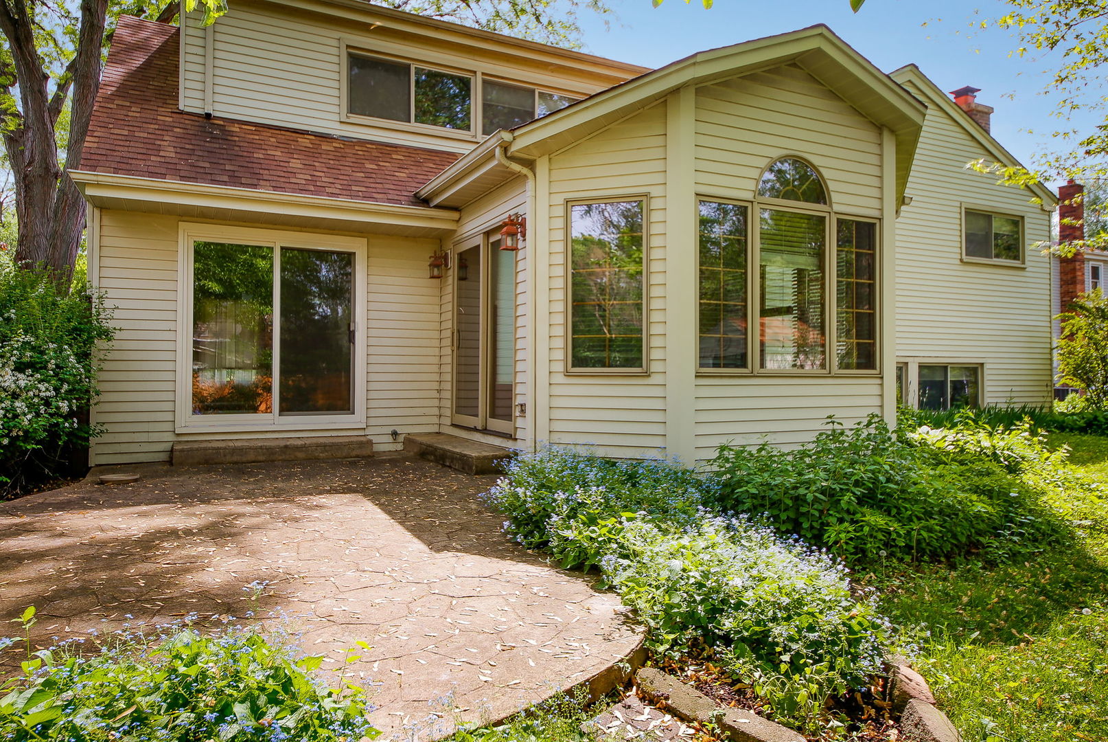 417 South River Road Naperville, IL 60540 - Photo 9 of 27 front view of a house with a yard