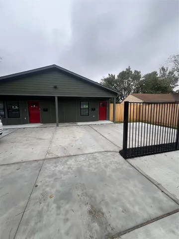 a front view of a house with a garage