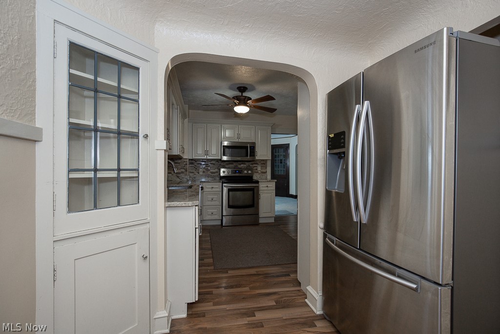 3571 Harvey Road Cleveland, OH 44118 - Photo 10 of 40 Stainless steel refrigerator and built in cabinet
