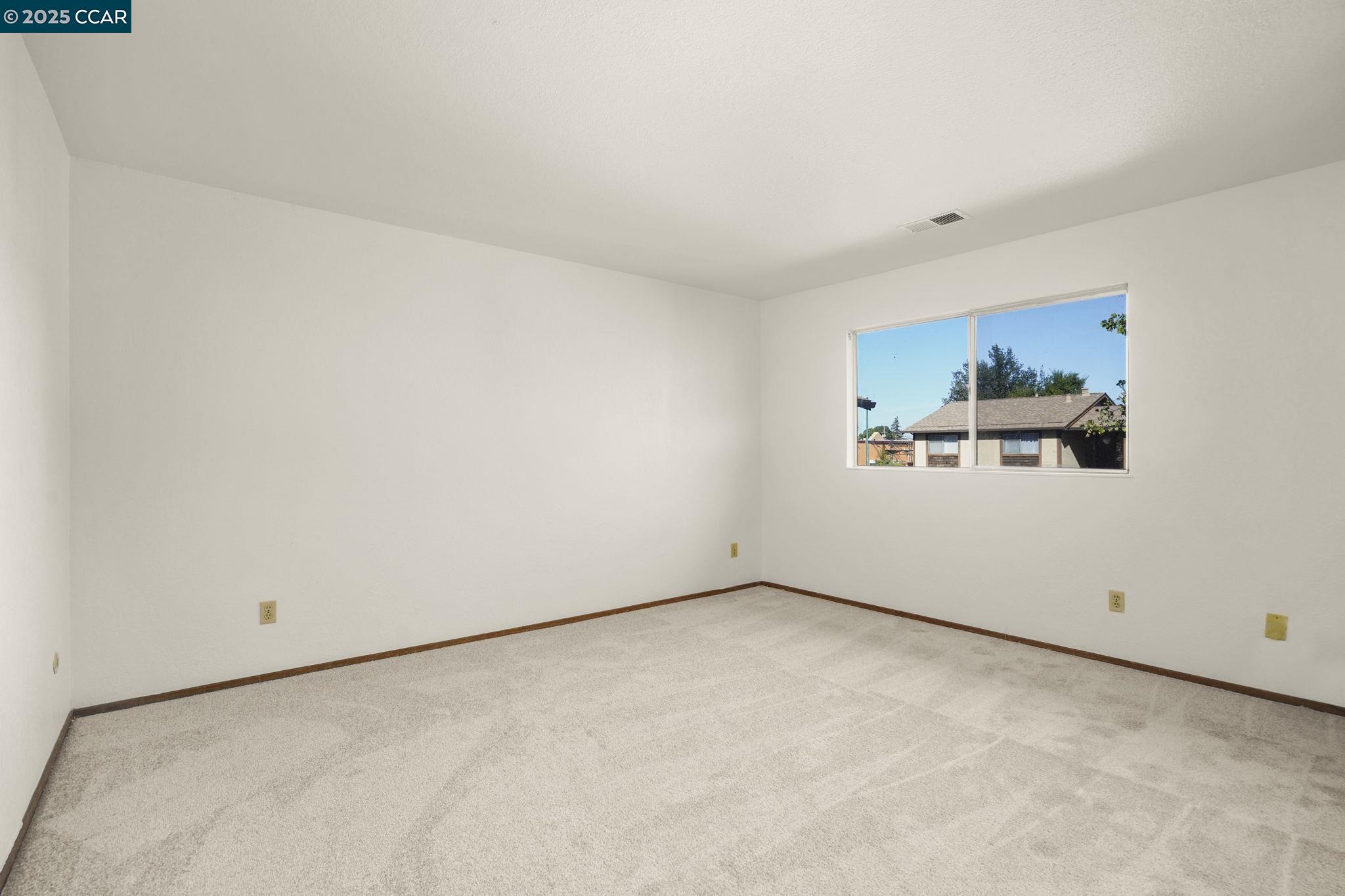 1440 Reganti Place, Unit 11 Concord, CA 94518 - Photo 9 of 15 a view of a room with wooden floor and window