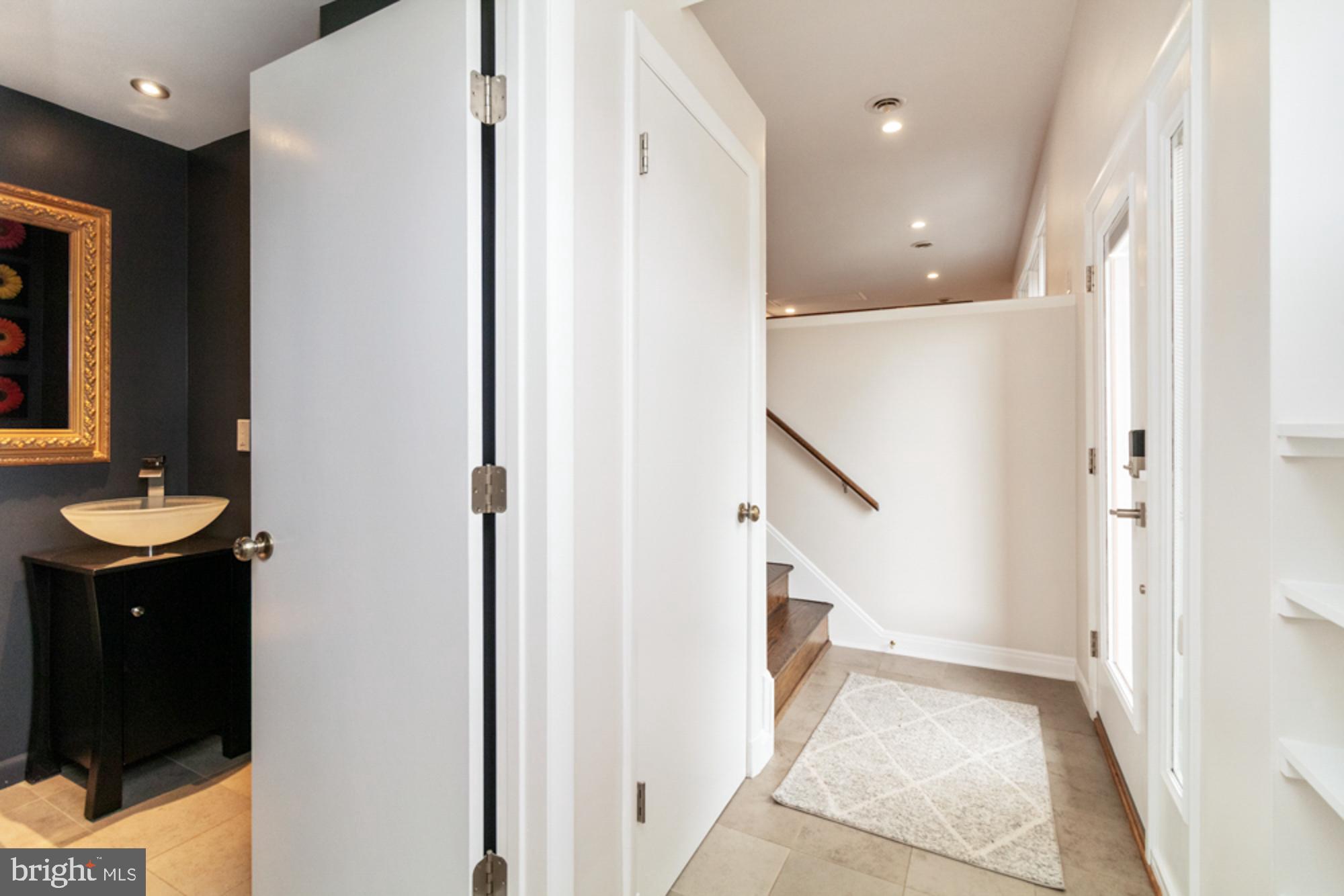 2414 Stanwick Road Phoenix, MD 21131 - Photo 4 of 50 powder room off foyer and family room