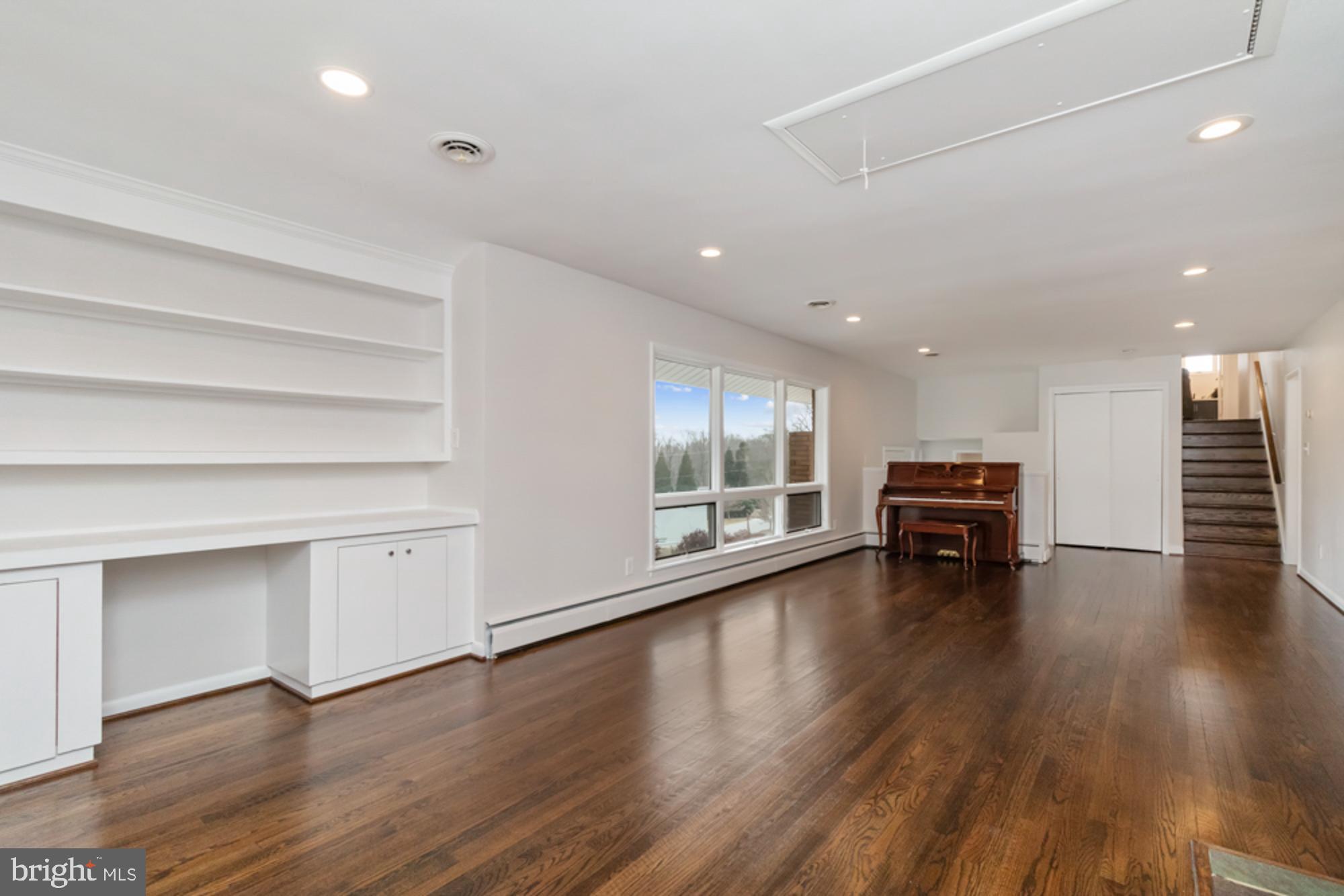 2414 Stanwick Road Phoenix, MD 21131 - Photo 8 of 50 Main lvl LR Updated windows abundant natural light