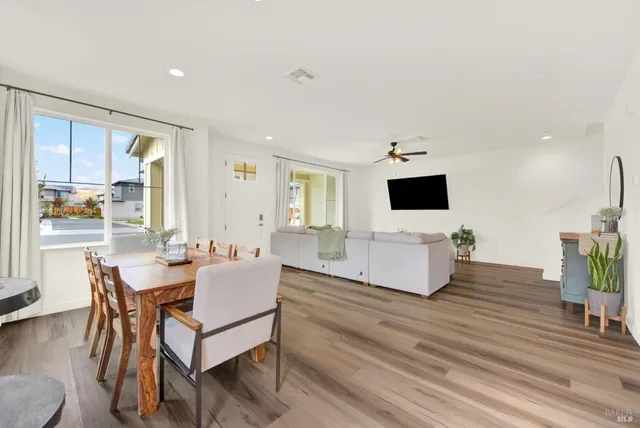 a kitchen with a refrigerator a sink and a stove