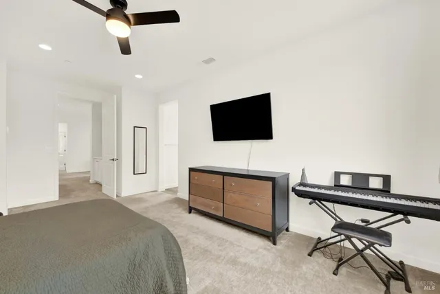 a bedroom with a bed and furniture