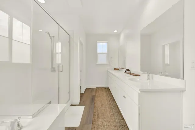 a bedroom with a bed furniture and a window