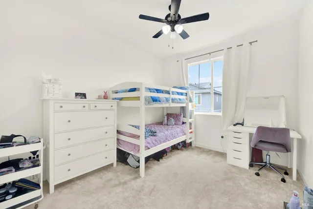 a bathroom with a sink and a white vanity
