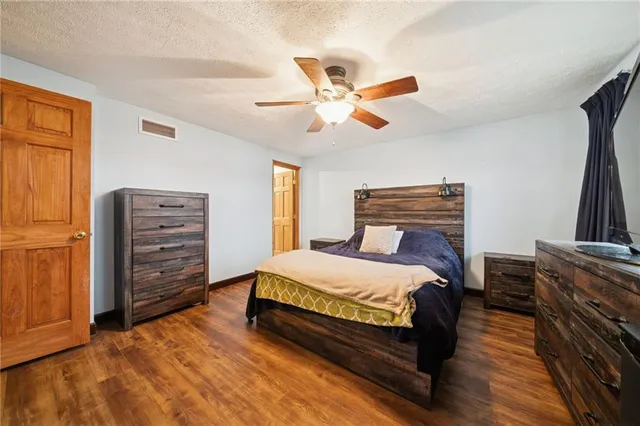 a bedroom with a bed and furniture