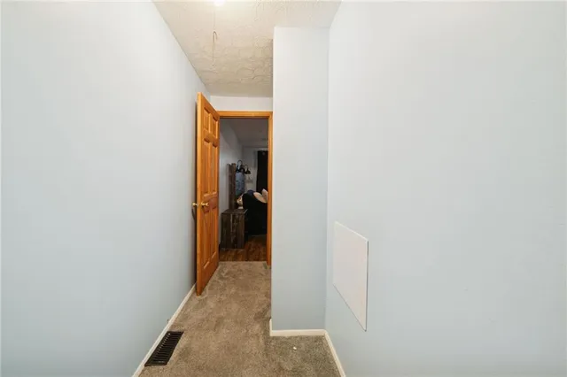 a hallway with a room